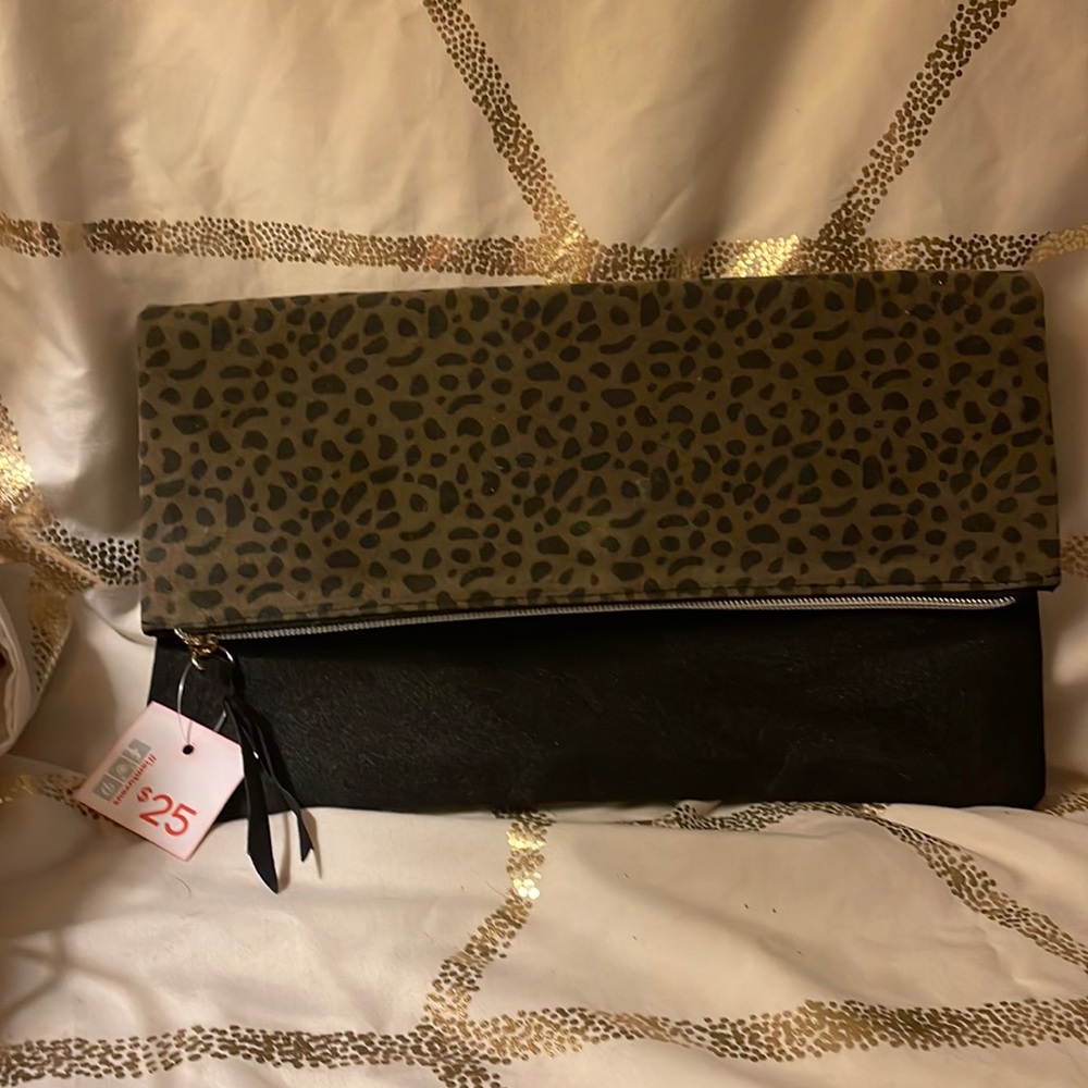 New with tags-Tuvous clutch or makeup bag animal print and black